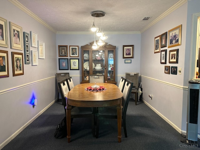 dining space featuring a textured ceiling, carpet floors, ornamental molding, and baseboards