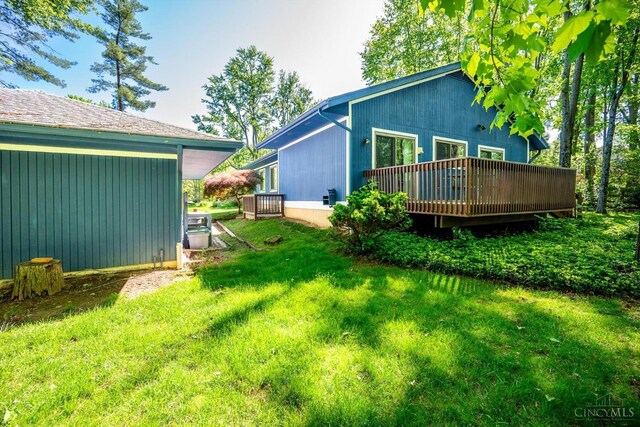 5672 Crooked Tree Ln, Miami Twp, OH 45150 - view of green lawn featuring a deck