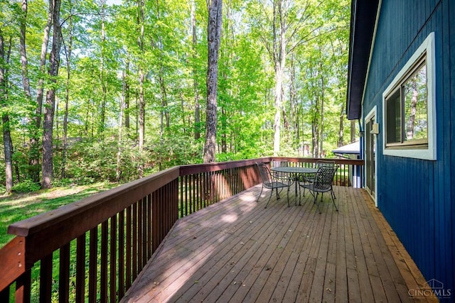 5672 Crooked Tree Ln, Miami Twp, OH 45150 - wooden deck with outdoor dining area