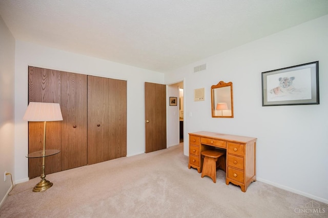 5672 Crooked Tree Ln, Miami Twp, OH 45150 - unfurnished bedroom featuring light colored carpet, a closet, and baseboards