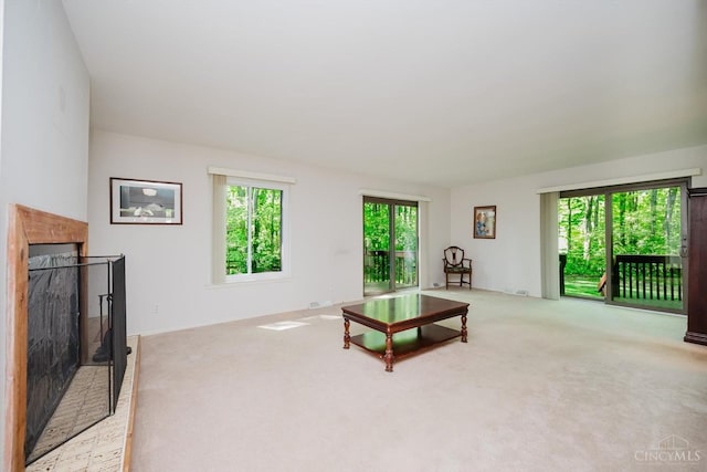5672 Crooked Tree Ln, Miami Twp, OH 45150 - carpeted living room featuring a brick fireplace
