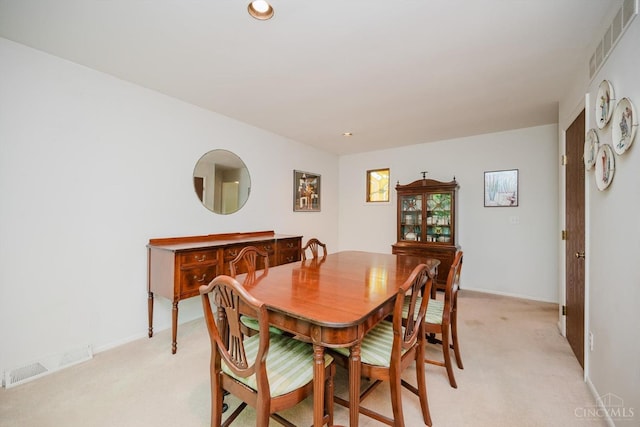 5672 Crooked Tree Ln, Miami Twp, OH 45150 - dining room featuring light colored carpet, baseboards, and recessed lighting
