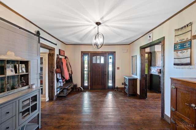 6241 Marathon Edenton Rd, Wayne Twp, OH 45107 - foyer entrance featuring ornamental molding, dark wood finished floors, and a barn door