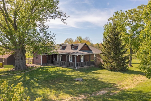 6241 Marathon Edenton Rd, Wayne Twp, OH 45107 - rear view of property with a yard and covered porch