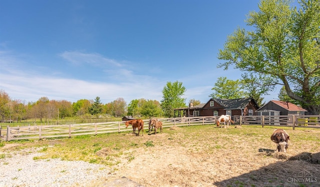 6241 Marathon Edenton Rd, Wayne Twp, OH 45107 - view of yard with an exterior structure, a rural view, and an outdoor structure
