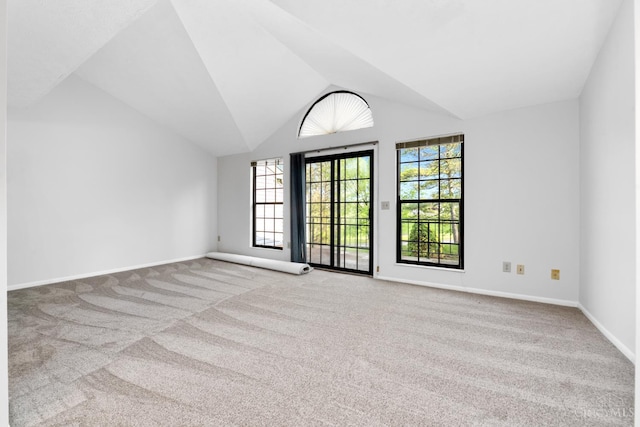 2869 Phaeton Ln, Deerfield Twp, OH 45039 - empty room featuring carpet floors, healthy amount of natural light, lofted ceiling, and baseboards
