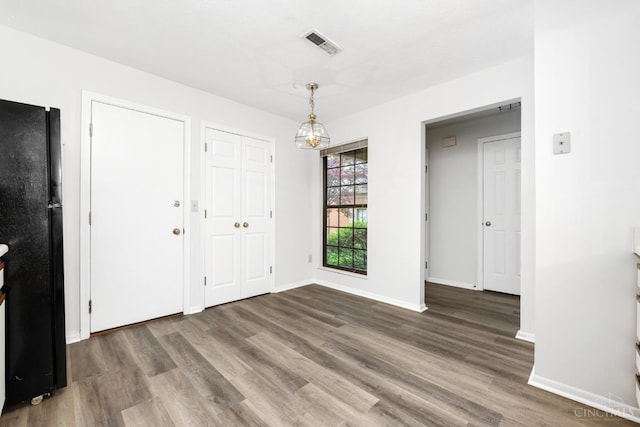 2869 Phaeton Ln, Deerfield Twp, OH 45039 - unfurnished dining area featuring wood finished floors and baseboards
