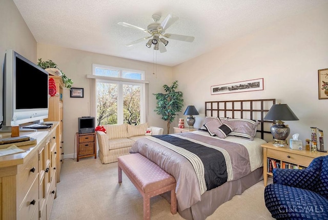 1668 Nichole Ct, Hamilton, OH 45013 - bedroom featuring light carpet, a textured ceiling, ceiling fan, and baseboards