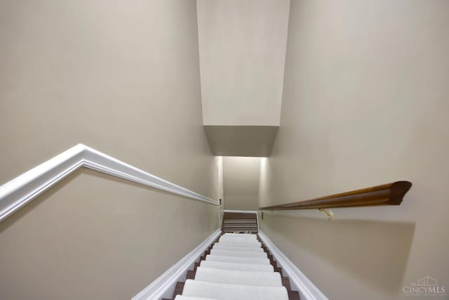 stairway with baseboards