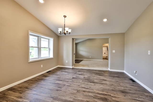 640 Frye Rd, Clay Twp, OH 45171 - spare room with lofted ceiling, a chandelier, dark wood-style flooring, baseboards, and recessed lighting
