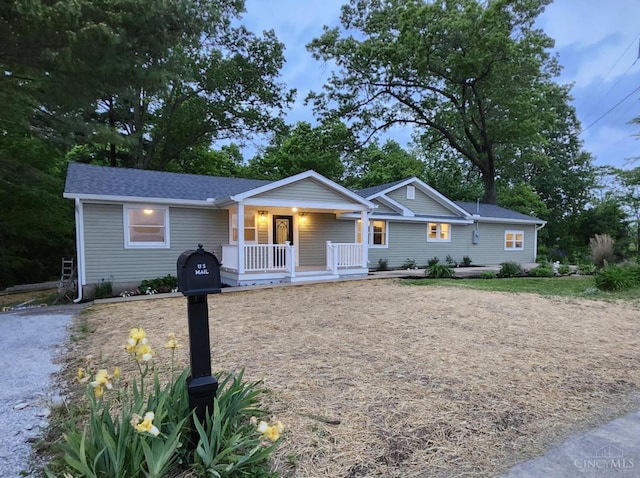 640 Frye Rd, Clay Twp, OH 45171 - ranch-style house featuring covered porch and a shingled roof