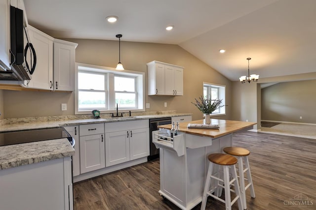 640 Frye Rd, Clay Twp, OH 45171 - kitchen featuring dishwasher, a sink, white cabinets, vaulted ceiling, and wood counters