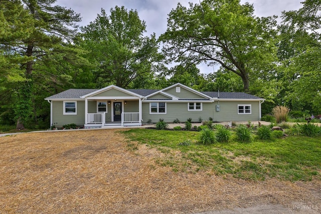 640 Frye Rd, Clay Twp, OH 45171 - ranch-style home with a porch and view of scattered trees