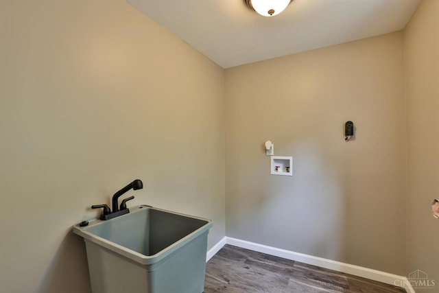 640 Frye Rd, Clay Twp, OH 45171 - laundry room featuring dark wood-style floors, hookup for a washing machine, and baseboards
