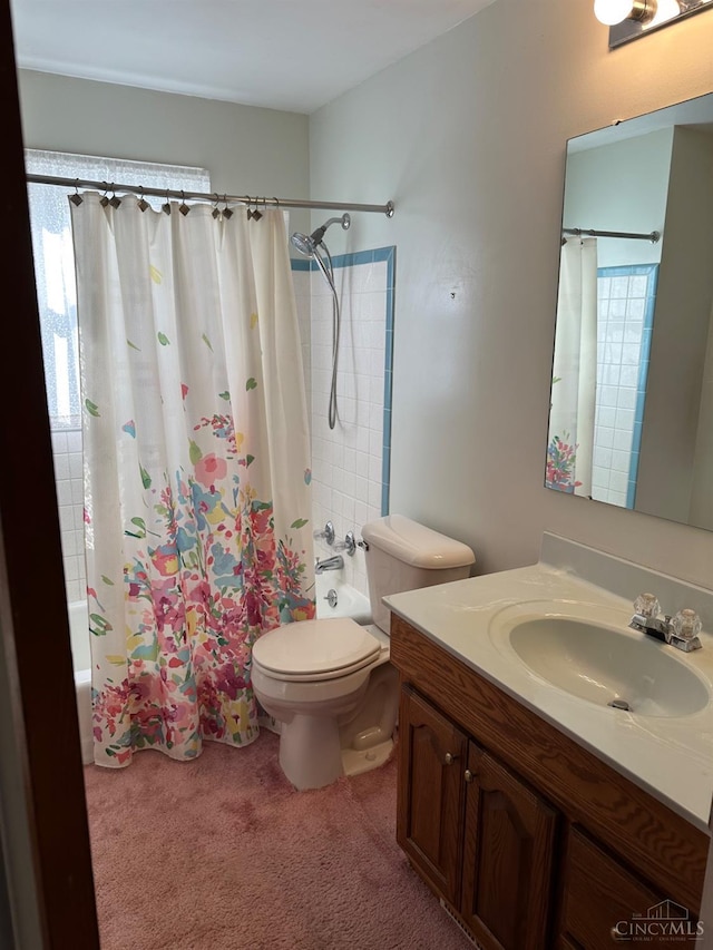full bath featuring shower / bath combo, toilet, and vanity