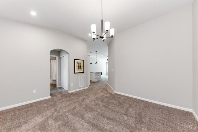 5880 Parkview Ln Unit 303, Miami Twp, OH 45150 - unfurnished room with carpet flooring, arched walkways, lofted ceiling, baseboards, and a chandelier