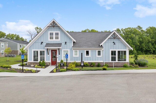 5880 Parkview Ln Unit 303, Miami Twp, OH 45150 - modern farmhouse with board and batten siding and a shingled roof