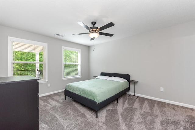 5880 Parkview Ln Unit 303, Miami Twp, OH 45150 - bedroom with baseboards, carpet floors, and a ceiling fan