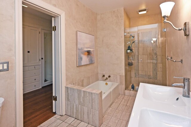1 Beech Crest Ln, Cincinnati, OH 45206 - full bathroom with a garden tub, a shower stall, and tile patterned flooring