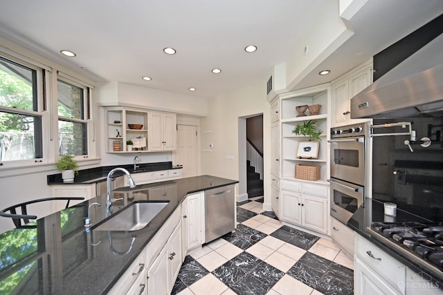 1 Beech Crest Ln, Cincinnati, OH 45206 - kitchen featuring open shelves, a sink, appliances with stainless steel finishes, recessed lighting, and wall chimney range hood