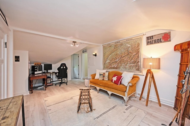1 Beech Crest Ln, Cincinnati, OH 45206 - living room featuring vaulted ceiling, wood finished floors, a desk, and baseboards