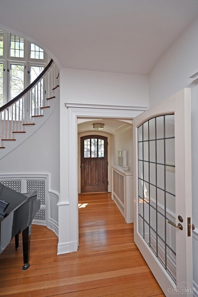 1 Beech Crest Ln, Cincinnati, OH 45206 - foyer featuring light wood-style floors and stairs
