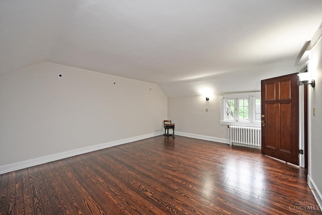 1 Beech Crest Ln, Cincinnati, OH 45206 - bonus room featuring radiator, vaulted ceiling, dark wood-style flooring, and baseboards