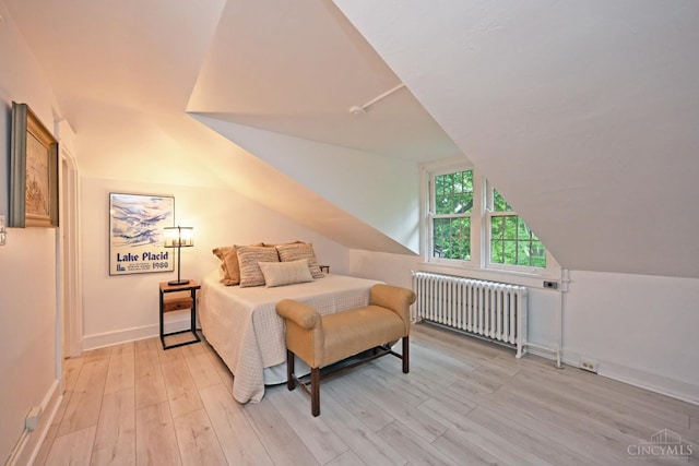 1 Beech Crest Ln, Cincinnati, OH 45206 - bedroom with radiator, light wood-type flooring, baseboards, and vaulted ceiling