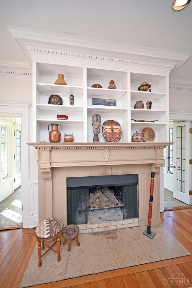 1 Beech Crest Ln, Cincinnati, OH 45206 - detailed view of a fireplace with flush hearth, wood finished floors, and ornamental molding
