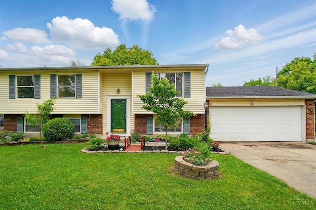 6289 Chablis Dr, Liberty Twp, OH 45011 - bi-level home with brick siding, concrete driveway, an attached garage, and a front yard
