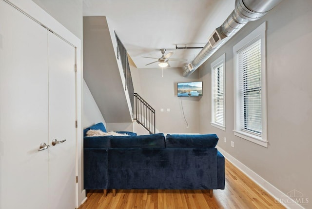 1406 Republic St Unit 102, Cincinnati, OH 45202 - living area featuring ceiling fan, light wood-style floors, and baseboards