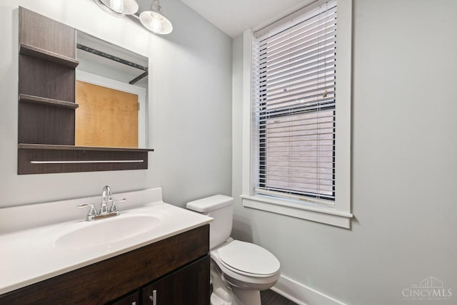 1406 Republic St Unit 102, Cincinnati, OH 45202 - half bath featuring toilet, baseboards, and vanity