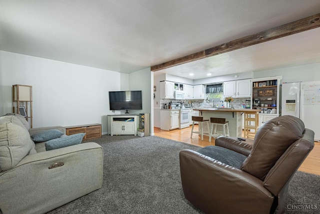 8588 Twincreek Dr, Franklin Twp, OH 45005 - living area featuring beam ceiling and recessed lighting