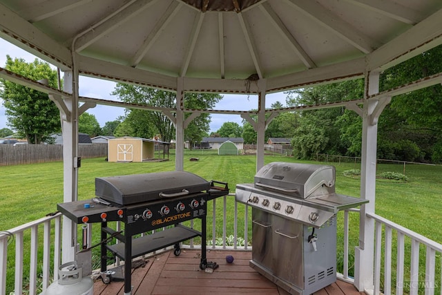 8588 Twincreek Dr, Franklin Twp, OH 45005 - deck with a storage unit, grilling area, and an outbuilding