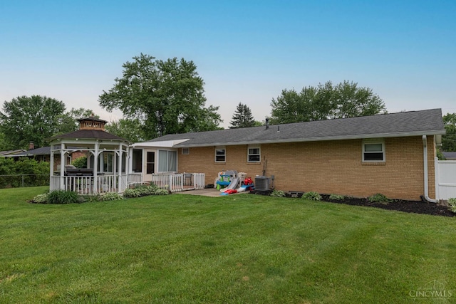 8588 Twincreek Dr, Franklin Twp, OH 45005 - back of house with a gazebo, brick siding, cooling unit, and a patio area