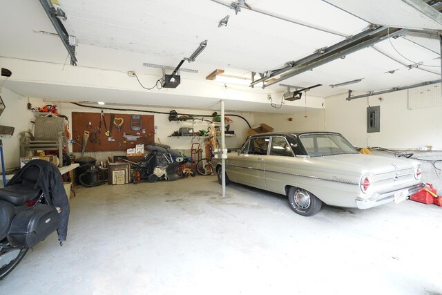 1260 Pine Forest Dr, Pierce Twp, OH 45102 - garage with a garage door opener and electric panel