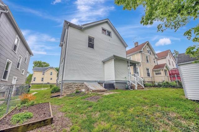 4604 Simpson Ave, Cincinnati, OH 45227 - rear view of house with central AC unit and a residential view