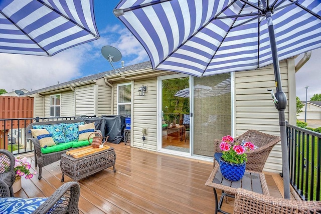 deck with an outdoor living space