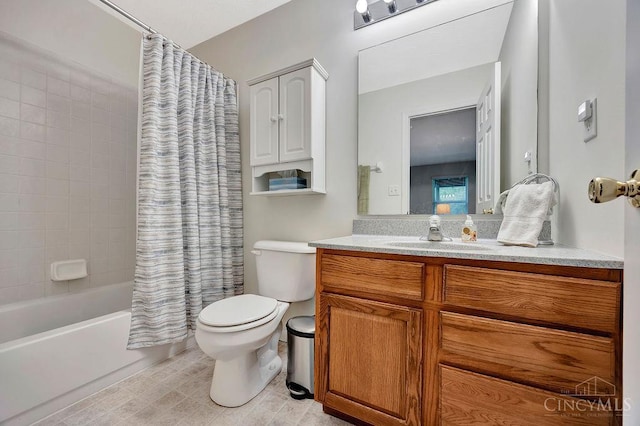 bathroom with toilet, vanity, and shower / bath combo