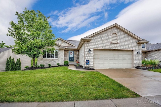 view of front facade featuring an attached garage, concrete driveway, a front yard, and brick siding
