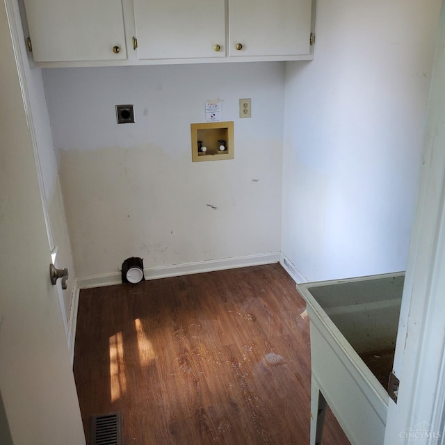10595 Cozaddale Murdock St, Hamilton Twp, OH 45122 - laundry room featuring hookup for an electric dryer, hookup for a washing machine, dark wood finished floors, and cabinet space