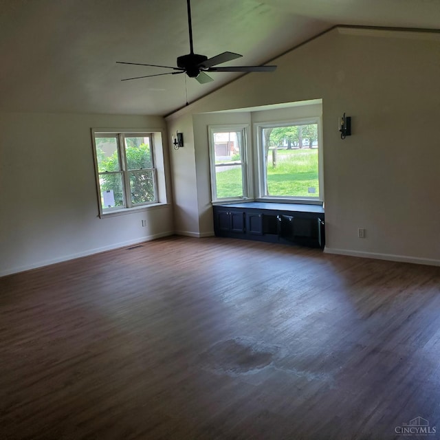 10595 Cozaddale Murdock St, Hamilton Twp, OH 45122 - unfurnished room featuring ceiling fan, lofted ceiling, dark wood finished floors, and baseboards