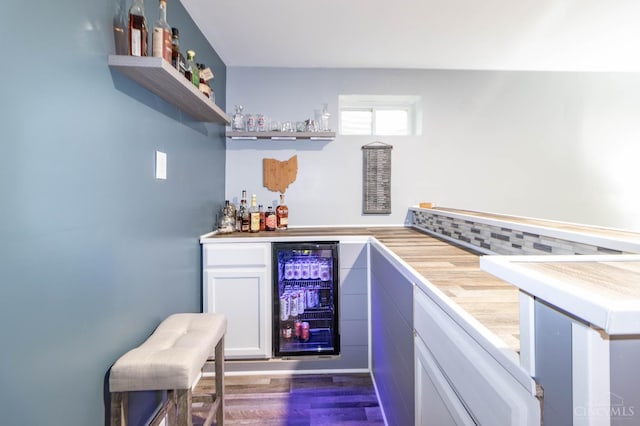 40 Glen Mary Dr, Pierce Twp, OH 45102 - indoor dry bar with wine cooler, dark wood-style flooring, and decorative backsplash