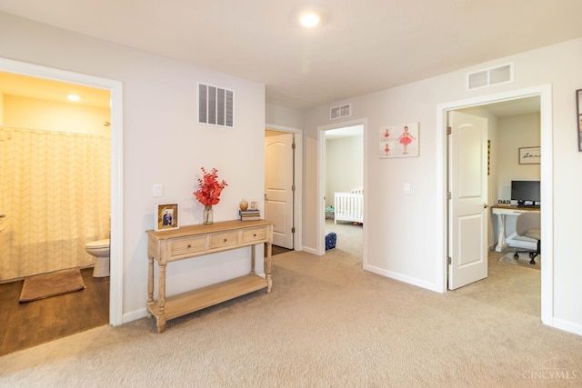40 Glen Mary Dr, Pierce Twp, OH 45102 - hall featuring radiator, light colored carpet, baseboards, and an office area