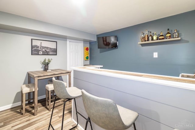 40 Glen Mary Dr, Pierce Twp, OH 45102 - bar area featuring light wood-type flooring and baseboards