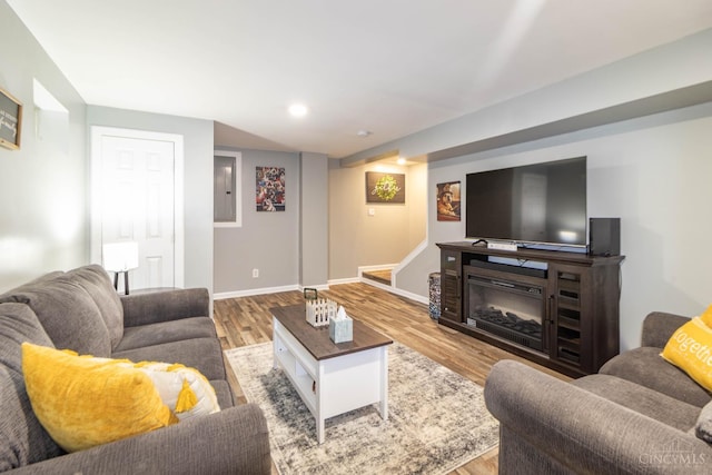 40 Glen Mary Dr, Pierce Twp, OH 45102 - living room featuring wood finished floors, baseboards, and stairs