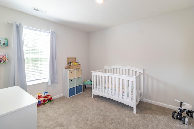 40 Glen Mary Dr, Pierce Twp, OH 45102 - carpeted bedroom featuring a nursery area and baseboards