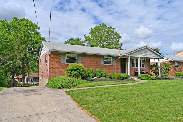 5638 Victoryview Ln, Delhi Twp, OH 45233 - ranch-style home with brick siding, a front lawn, and a porch