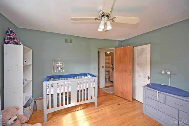 5638 Victoryview Ln, Delhi Twp, OH 45233 - bedroom with light wood finished floors and ceiling fan
