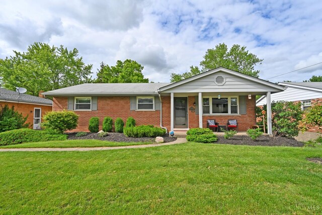 5638 Victoryview Ln, Delhi Twp, OH 45233 - single story home featuring brick siding, a front lawn, and a porch